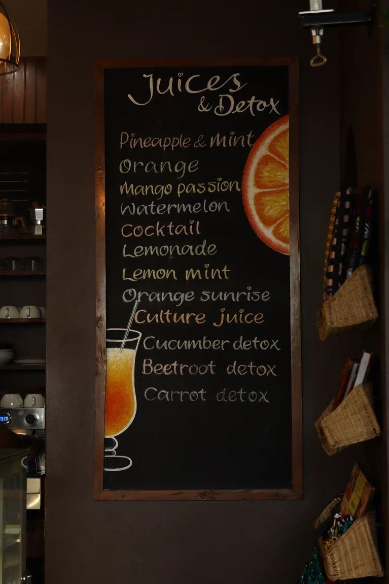 The handwritten juices and detox board at Coffee Culture